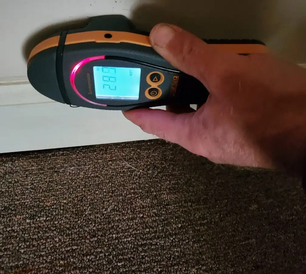 Moisture detection at baseboard during Sewage Cleanup & Sanitation in Bixby